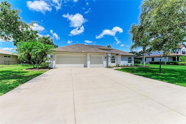 208 147th St NE, Bradenton, FL 34212 - ranch-style home featuring stucco siding, an attached garage, and concrete driveway
