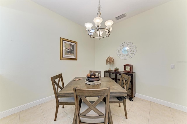 208 147th St NE, Bradenton, FL 34212 - dining space featuring a chandelier and light tile patterned floors