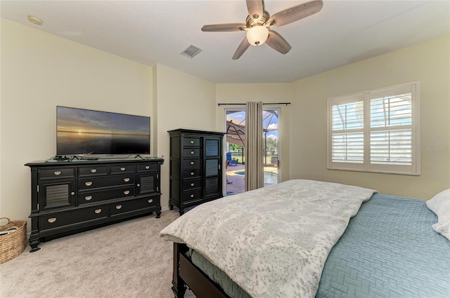 208 147th St NE, Bradenton, FL 34212 - bedroom with access to outside, carpet, and a ceiling fan