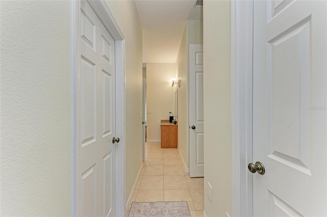 208 147th St NE, Bradenton, FL 34212 - corridor with light tile patterned floors and baseboards