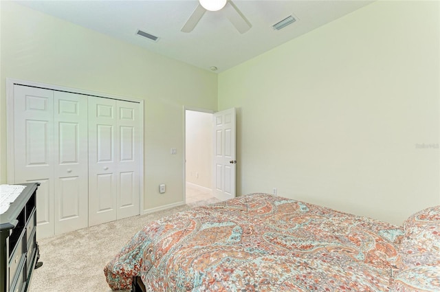 208 147th St NE, Bradenton, FL 34212 - bedroom with light carpet, ceiling fan, and a closet