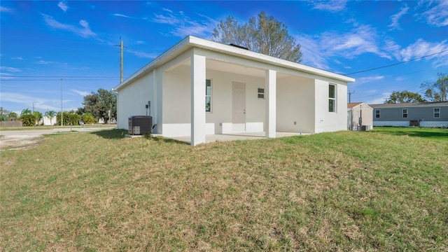 4796 Duncan Rd, Punta Gorda, FL 33982 - view of front facade featuring stucco siding and a front lawn
