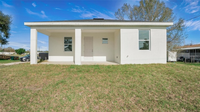 4796 Duncan Rd, Punta Gorda, FL 33982 - view of front of house with stucco siding and a front yard