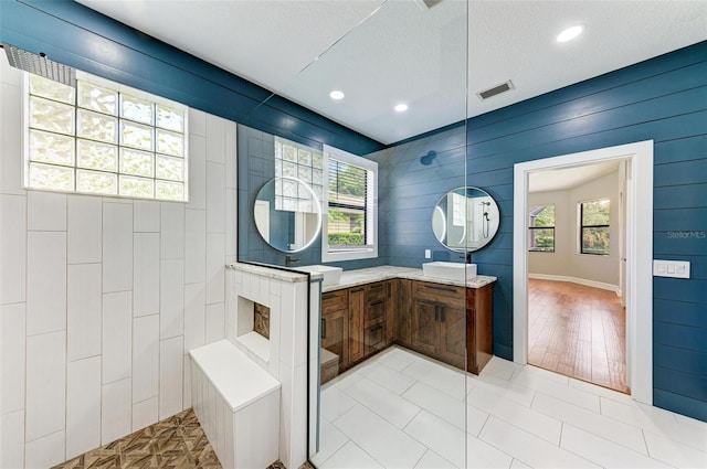 6423 Royal Tern Cir, Lakewood Ranch, FL 34202 - full bathroom featuring plenty of natural light, walk in shower, vanity, and recessed lighting
