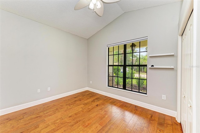 6423 Royal Tern Cir, Lakewood Ranch, FL 34202 - empty room featuring lofted ceiling, hardwood / wood-style flooring, and ceiling fan
