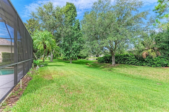 6423 Royal Tern Cir, Lakewood Ranch, FL 34202 - view of green lawn featuring a lanai