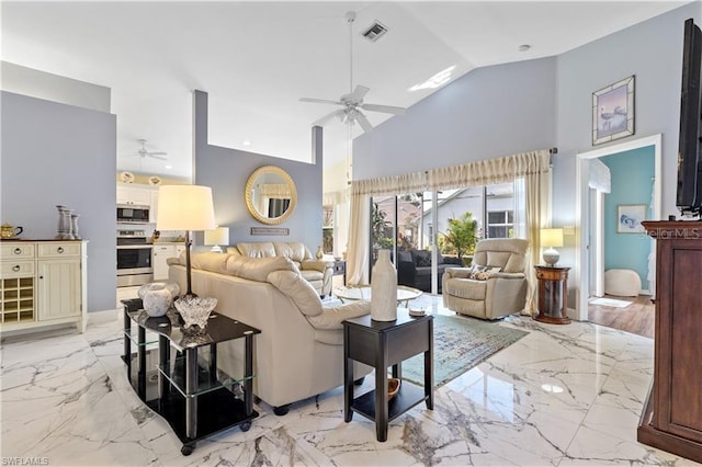 3760 Gloxinia Dr, North Fort Myers, FL 33917 - living area with ceiling fan, light marble finish flooring, and high vaulted ceiling