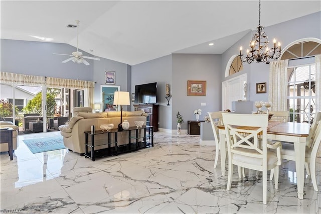 3760 Gloxinia Dr, North Fort Myers, FL 33917 - dining space featuring high vaulted ceiling, marble tiled flooring, ceiling fan, a chandelier, and baseboards