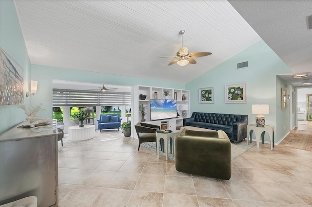 6832 Woodwind Dr Unit 53, Sarasota, FL 34231 - living room with ceiling fan, light tile patterned floors, and high vaulted ceiling
