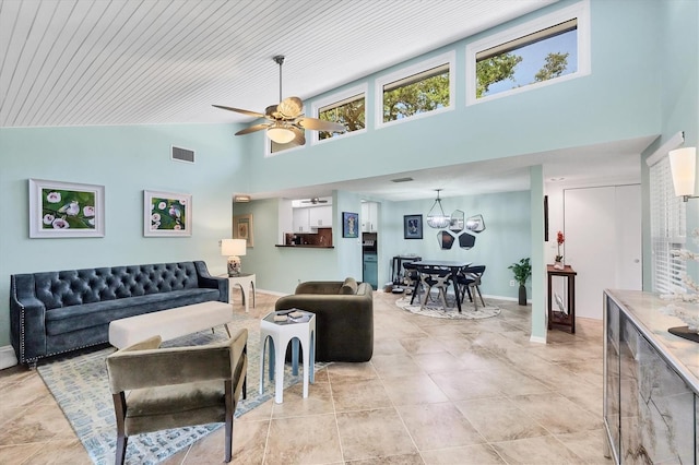 6832 Woodwind Dr Unit 53, Sarasota, FL 34231 - living room featuring high vaulted ceiling and a ceiling fan