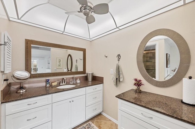 6832 Woodwind Dr Unit 53, Sarasota, FL 34231 - full bathroom featuring vanity, ceiling fan, and tile patterned floors