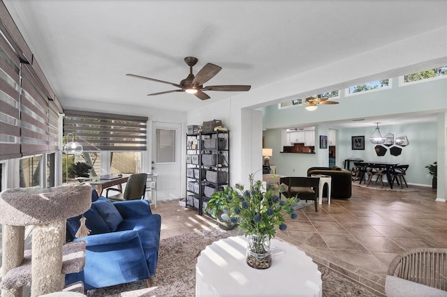 6832 Woodwind Dr Unit 53, Sarasota, FL 34231 - living area with a ceiling fan and tile patterned flooring