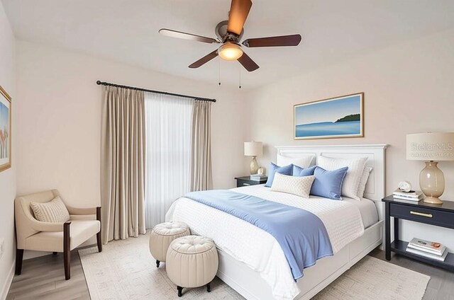 718 17th St E, Bradenton, FL 34208 - bedroom featuring wood finished floors and ceiling fan