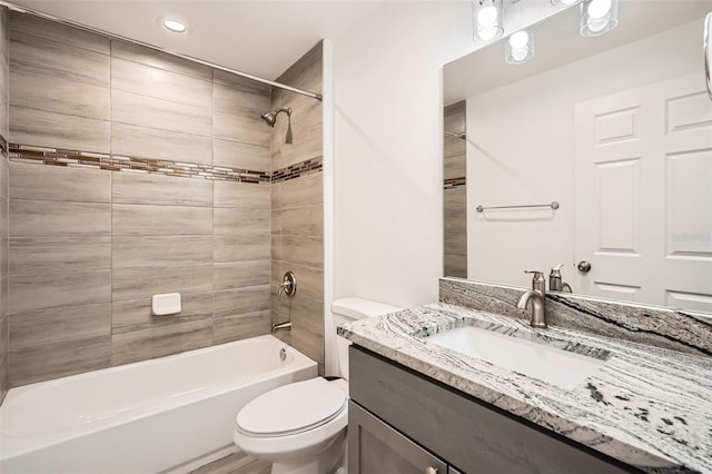718 17th St E, Bradenton, FL 34208 - bathroom with vanity, bathtub / shower combination, and recessed lighting