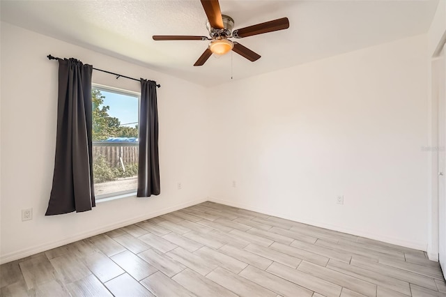 718 17th St E, Bradenton, FL 34208 - spare room featuring ceiling fan and light wood-style floors