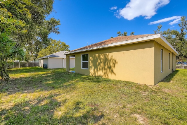 718 17th St E, Bradenton, FL 34208 - view of side of home with stucco siding