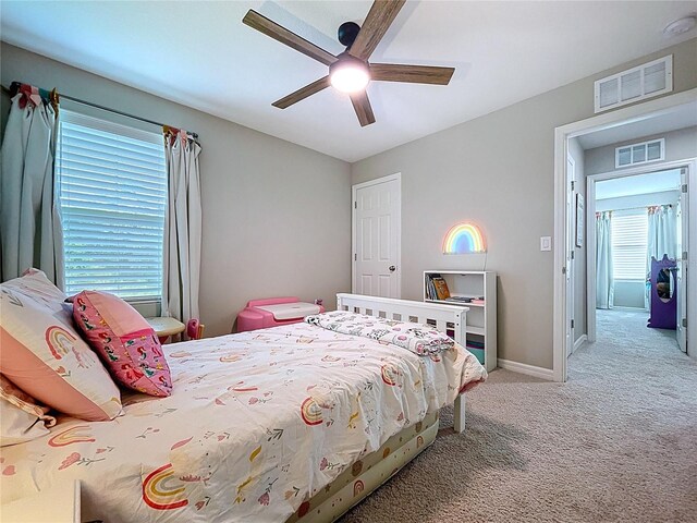 12832 Oak Hill Way, Parrish, FL 34219 - carpeted bedroom with ceiling fan and baseboards