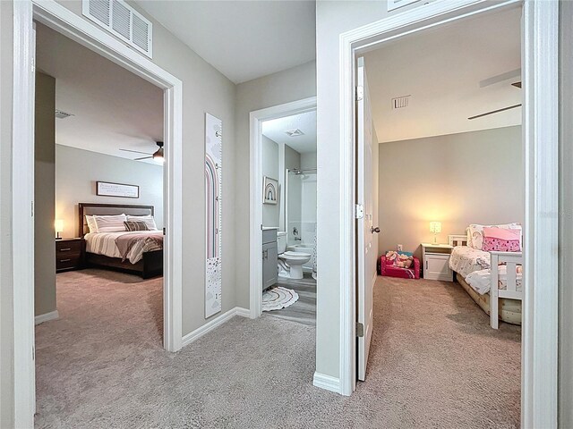 12832 Oak Hill Way, Parrish, FL 34219 - bedroom featuring carpet floors and ensuite bathroom