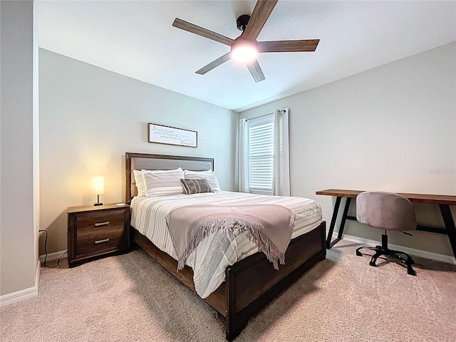 12832 Oak Hill Way, Parrish, FL 34219 - bedroom with light colored carpet and a ceiling fan