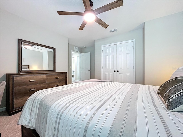 12832 Oak Hill Way, Parrish, FL 34219 - bedroom with a closet, ceiling fan, and light colored carpet