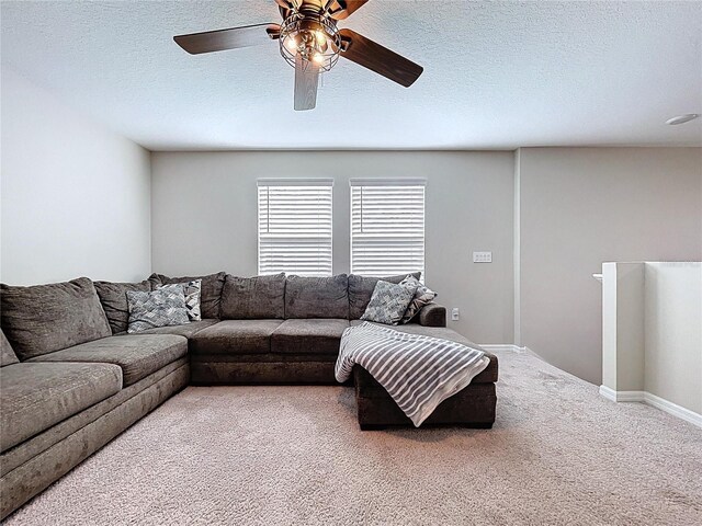 12832 Oak Hill Way, Parrish, FL 34219 - living area featuring carpet flooring, a ceiling fan, and a textured ceiling
