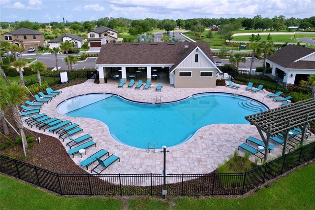 12832 Oak Hill Way, Parrish, FL 34219 - community pool featuring a patio area and a residential view