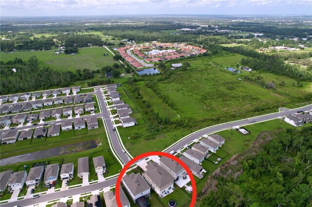 12832 Oak Hill Way, Parrish, FL 34219 - aerial view of property and surrounding area with nearby suburban area