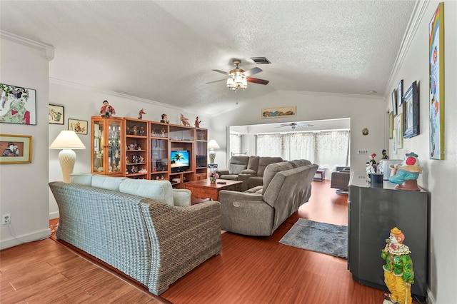 20 Idle Sands Dr, Venice, FL 34293 - living room with ceiling fan, a textured ceiling, wood finished floors, crown molding, and lofted ceiling