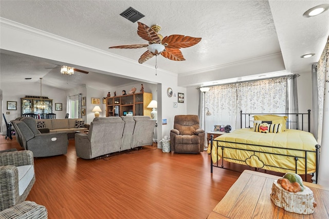 20 Idle Sands Dr, Venice, FL 34293 - living area featuring wood finished floors, a ceiling fan, a textured ceiling, crown molding, and lofted ceiling