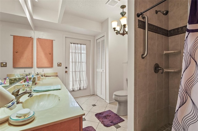 20 Idle Sands Dr, Venice, FL 34293 - full bathroom featuring double vanity, tile patterned flooring, a tile shower, and a closet