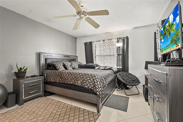 20 Idle Sands Dr, Venice, FL 34293 - bedroom with a textured ceiling, light tile patterned floors, and a ceiling fan