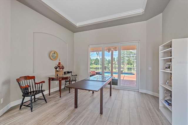 5523 Secluded Oaks Way, Sarasota, FL 34233 - playroom featuring wood finished floors, a tray ceiling, and ornamental molding