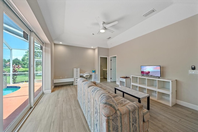 5523 Secluded Oaks Way, Sarasota, FL 34233 - living room featuring light wood finished floors, ceiling fan, and recessed lighting