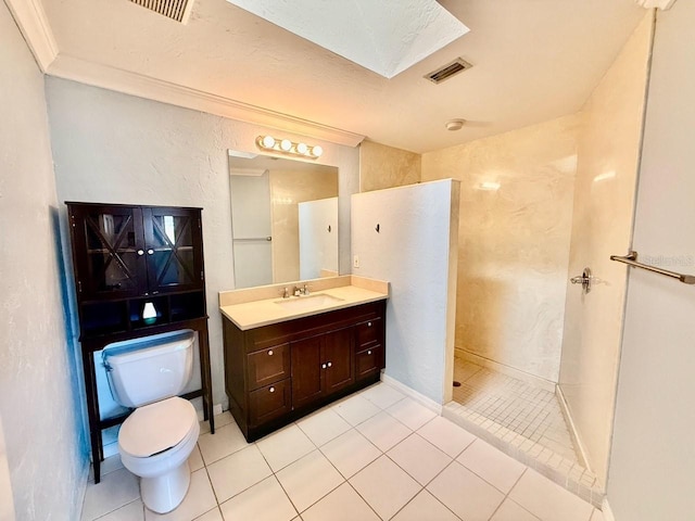 5615 Waneta Pl, Sarasota, FL 34231 - bathroom featuring vanity, a walk in shower, tile patterned flooring, and crown molding