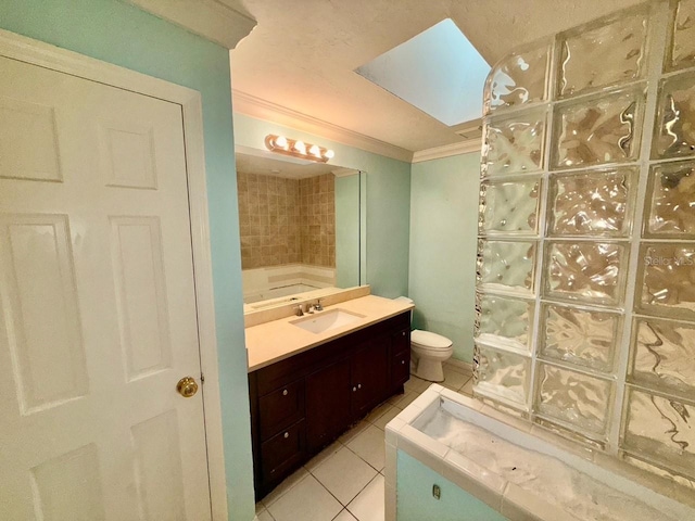 5615 Waneta Pl, Sarasota, FL 34231 - bathroom with vanity, tile patterned floors, and ornamental molding