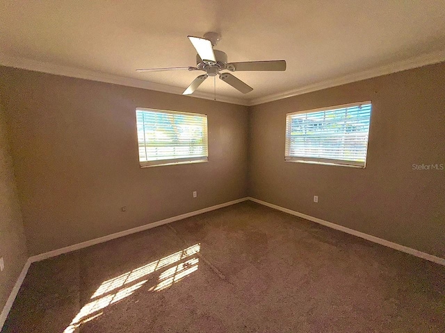 5615 Waneta Pl, Sarasota, FL 34231 - carpeted empty room with crown molding, healthy amount of natural light, and a ceiling fan
