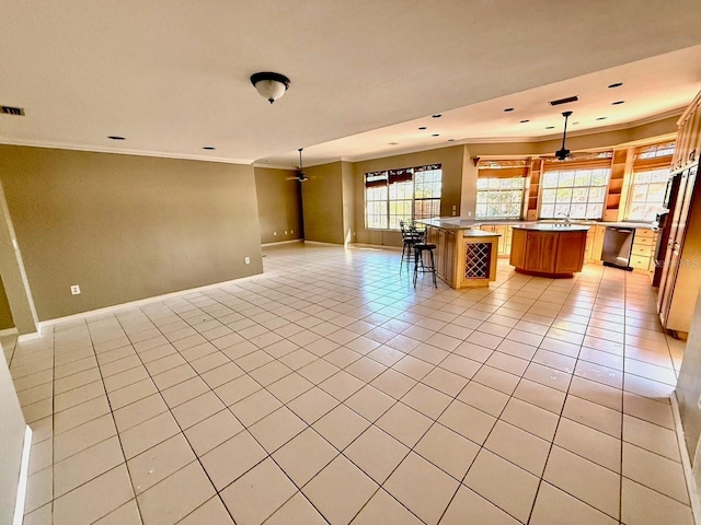 5615 Waneta Pl, Sarasota, FL 34231 - kitchen with a ceiling fan, open floor plan, crown molding, a kitchen island, and stainless steel dishwasher