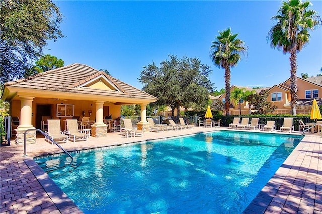 8168 Villa Grande Ct, Sarasota, FL 34243 - community pool featuring a patio
