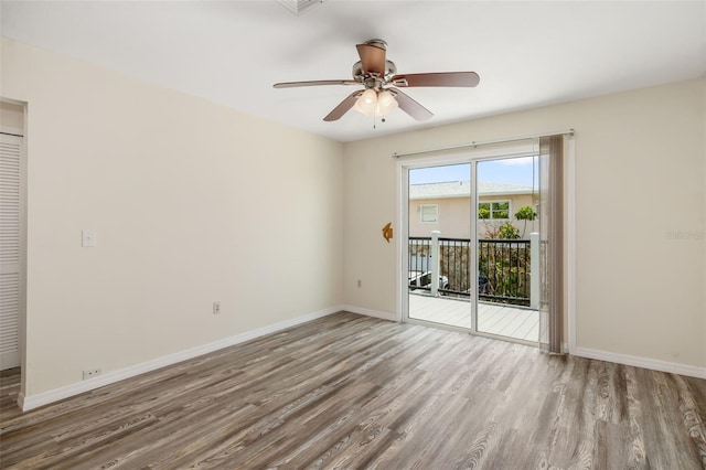 2513 Avenue B Ave B, Unit B, Bradenton Beach, FL 34217 - spare room featuring wood finished floors and a ceiling fan