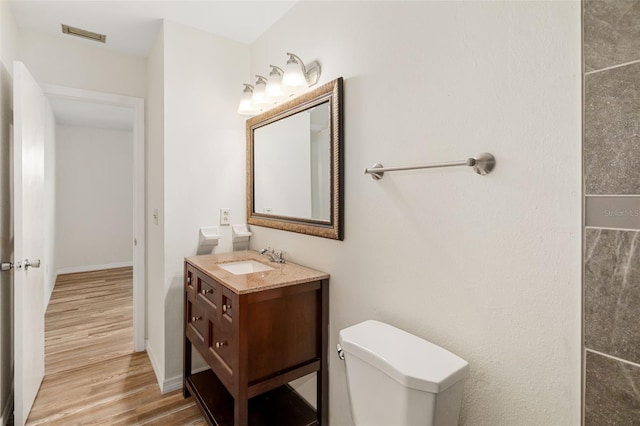 2513 Avenue B Ave B, Unit B, Bradenton Beach, FL 34217 - bathroom featuring vanity and wood finished floors