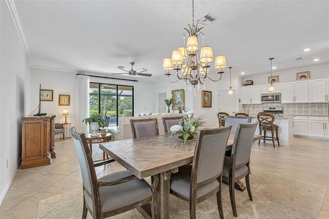 6507 Clairborne Ln, Bradenton, FL 34211 - dining space with light tile patterned floors, ceiling fan, ornamental molding, a chandelier, and recessed lighting