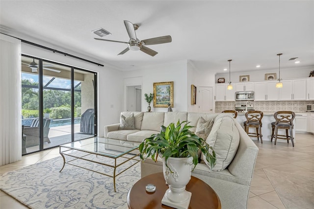 6507 Clairborne Ln, Bradenton, FL 34211 - living area featuring ceiling fan, light tile patterned flooring, crown molding, and recessed lighting
