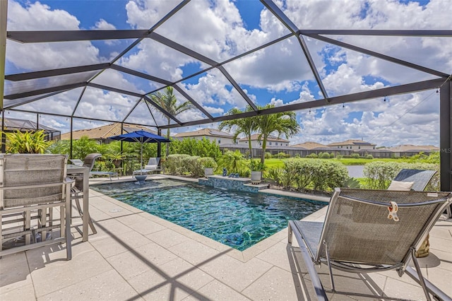 6507 Clairborne Ln, Bradenton, FL 34211 - swimming pool with a patio area, glass enclosure, outdoor dining space, and a jacuzzi