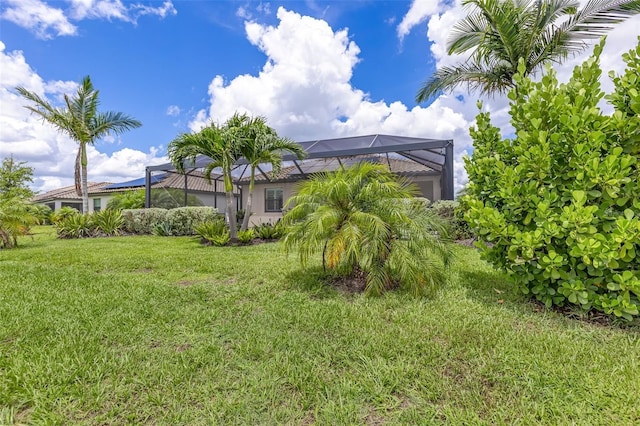 6507 Clairborne Ln, Bradenton, FL 34211 - view of green lawn featuring glass enclosure