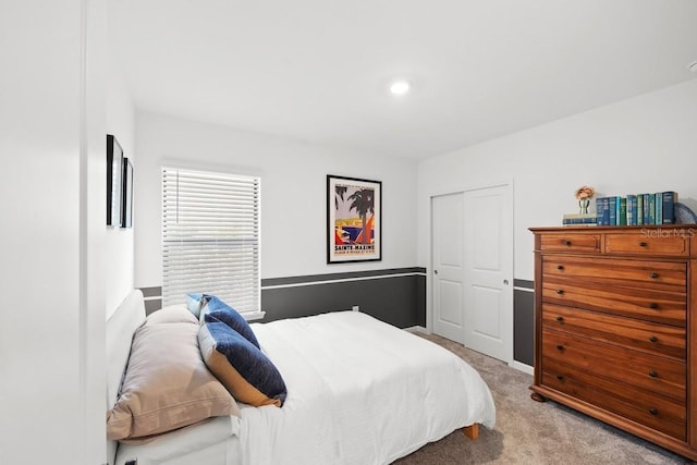 6563 Silverstar Dr, Sarasota, FL 34240 - bedroom with light carpet and a closet
