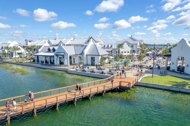 6563 Silverstar Dr, Sarasota, FL 34240 - dock featuring a residential view and a water view