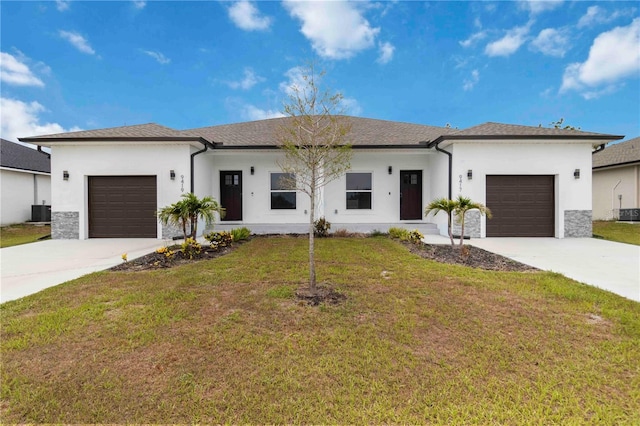 9417 Agate St, Port Charlotte, FL 33981 - view of front facade featuring a garage, concrete driveway, stucco siding, and a front yard