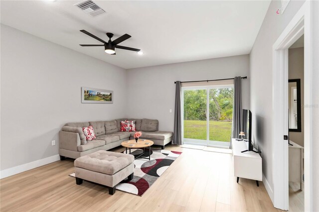 9417 Agate St, Port Charlotte, FL 33981 - living area featuring wood finished floors, a ceiling fan, baseboards, and recessed lighting