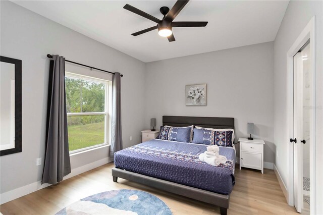 9417 Agate St, Port Charlotte, FL 33981 - bedroom featuring light wood-type flooring, baseboards, and ceiling fan