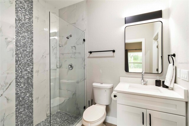 9417 Agate St, Port Charlotte, FL 33981 - full bathroom with toilet, a marble finish shower, and vanity